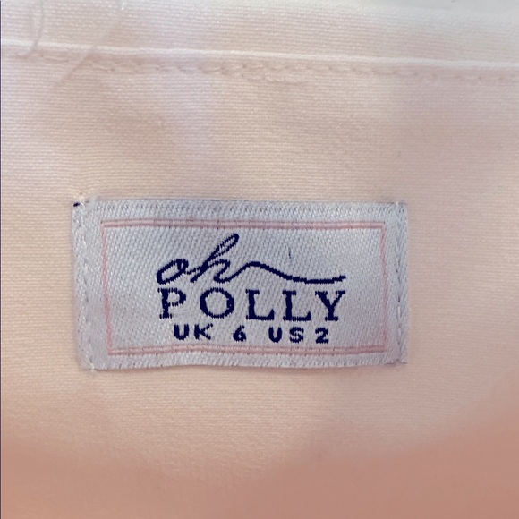 Isadora Bow-Detail Pleated A-Line
Midi Dress in Ivory - Picture 7 of 7